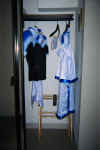 Zephel and Sei-lan's shirts hanging in the closet at the hotel where they were shaking up together. .^_~